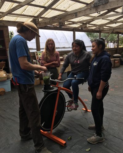 Summer 2018 interns: Susannah Olson Day, Abby May and Karen Conrrado with Matthew Richards, smoothie making with the bike blender!